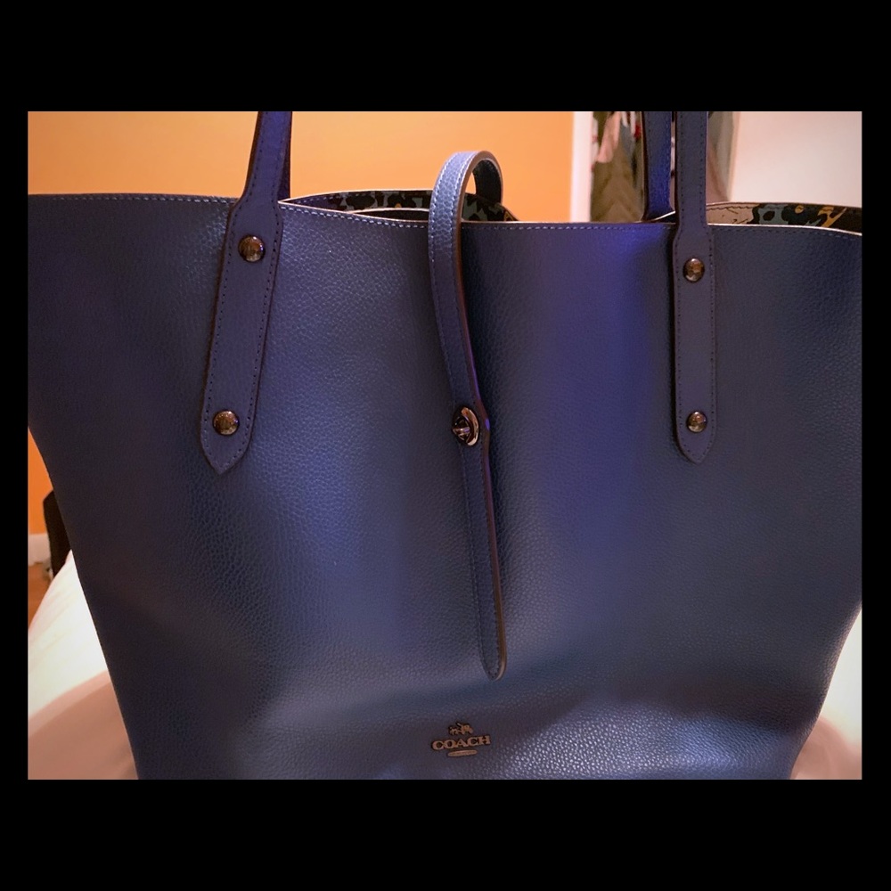 Blue Coach Tote with floral print .Great condition